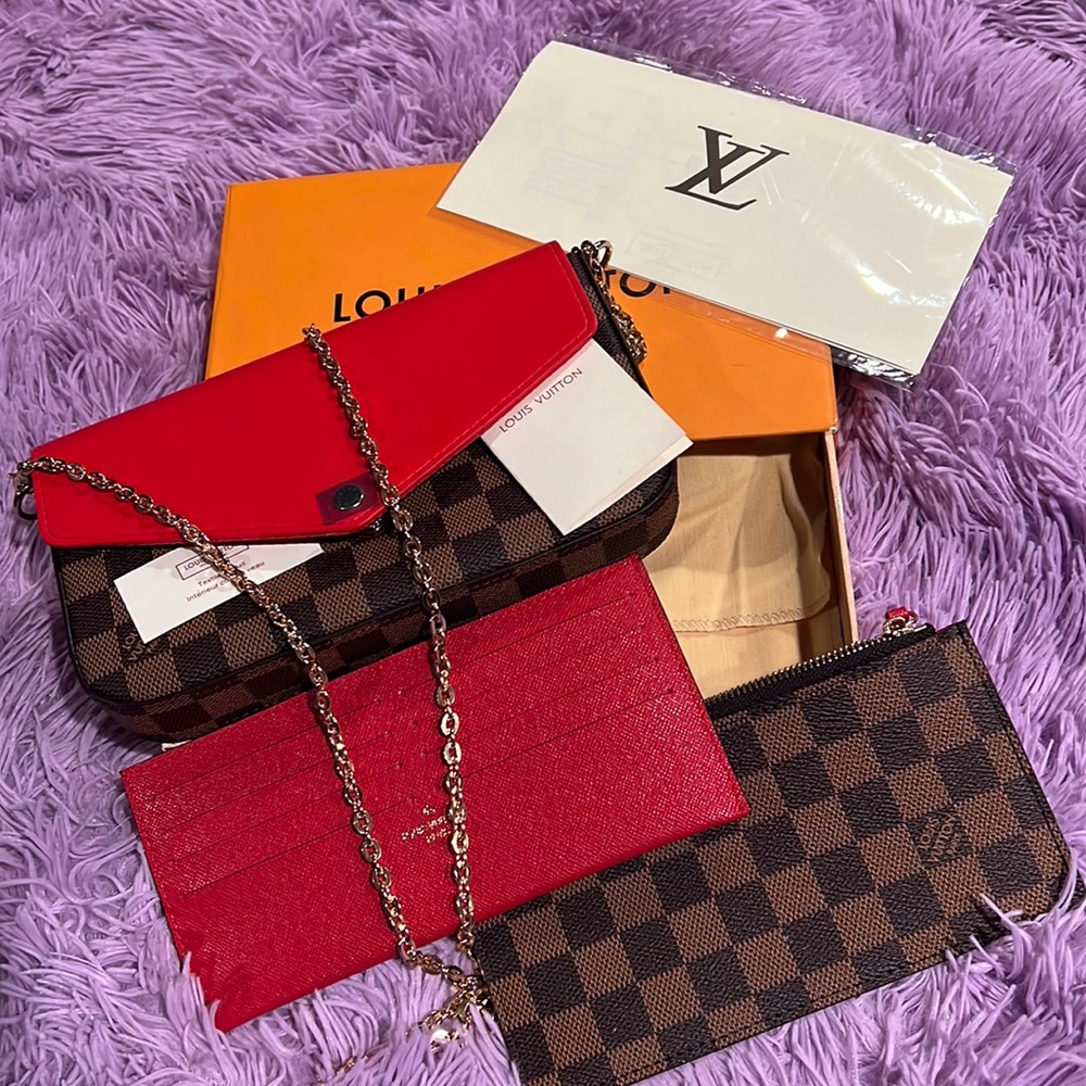 LOUIS VUITTON CROSS BODY HAND BAG